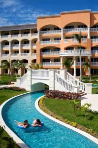 Фото отеля Iberostar Rose Hall Suites Hotel Монтего Бей Ямайка - фото отеля Iberostar Rose Hall Suites Hotel Ямайка отзыв Эс Ай Турс энд Трэвел